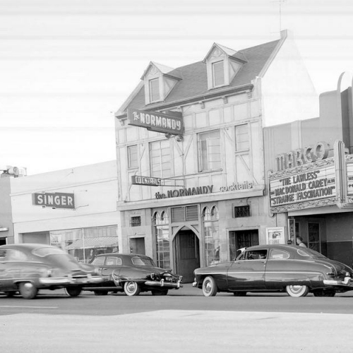 Oceanside Historical Society - Margo Theater The Normandy Singer Jeweler Finnell 200 Block North Hill Street 1950_resize